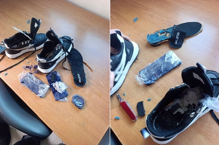Έκρυβε κινητά τηλέφωνα στους πάτους των παπουτσιών της για να τα δώσει σε κρατούμενο στις φυλακές Δομοκού